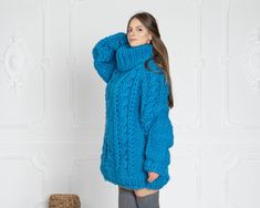 "MATERIAL : 5 strands of 100 % soft wool COLOUR : Blue ( There may be a slight difference because of the different monitors' representation) ♥ In the picture the model is wearing a garment with these measurements : A: ( Body lenght) : 33.8 \" / 86 cm B: ( Chest width) : 24.8 \" / 63 cm C: (Sleeve from under the arm) : 22 \" / 56 cm D: (Neck unrolled) : 12.5 \" / 32 cm They are taken with the item laid flat and not streched. ♥ For choosing your size please look at size chart in our listing pictur Blue Cozy Knitting Pattern For Fall, Cozy Blue Knitting Pattern For Fall, Blue Chunky Knit Turtleneck Sweater, Fall Blue Chunky Knit Pattern, Oversized Blue Knitted Sweater, Chunky Knit Blue Knitting Pattern For Fall, Oversized Hand Knitted Blue Sweater, Cozy Blue Chunky Knit Pattern, Oversized Hand-knitted Blue Sweater