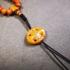 ❤This unique bone carved ruyi pendant is made by Tibetan craftsmen in Hepo Township, Baiyu County, the birthplace of the famous Tibetan handicrafts.You can use it as a spacer bead on mala,or pendant bead under guru bead.Also can be use as amulet pendant or keychain.❤DetailsMaterial:yak boneSIZE:Height:28mm / 1.1 inchesWidth: 12mm / 0.47 inchesThickness:8mm / 0.31 inchesYou'll get 1 * mala pendant as pictures shown.❤About Spacer bead on MalaMala Beads are often used as a meditation tool,Spacer be Carved Beaded Necklaces For Spiritual Gifts, Spiritual Carved Beaded Necklace As Gift, Spiritual Carved Beaded Necklace For Gift, Adjustable Carved Amulet Style Necklaces, Wooden Beads Amulet Jewelry For Meditation, Adjustable Wooden Beads Amulet Jewelry, Adjustable Wooden Bead Amulet Jewelry, Traditional Carved Adjustable Beaded Necklaces, Adjustable Amulet Style Jewelry With Wooden Beads