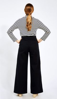 The Long Sabrina Pants are the high waisted flattering pants you need in your life! We cut these to flatter your waist and butt, with front and back pockets. Made from washed stretch Black twill and featuring wide belt loops and side zipper closure. FIT NOTE: The measurements below are of the actual pants. These are made with stretch fabric and will fit up to 2" bigger if needed as they will stretch to fit your body. If you want a tight snug fit, we suggest buying these in the smallest size that High Rise Cotton Pants For Fall, High Rise Bottoms For Workwear, Versatile High Rise Bottoms For Fall, Mid-rise Cotton Bottoms For Work, High Rise Cotton Wide Leg Pants For Fall, High Rise Bottoms With Hip Pockets For Fall, High Rise Workwear Bottoms With Five Pockets, High-rise Pants With Loosely Fitted Hips For Fall, High Waist Cotton Chinos With Belt Loops