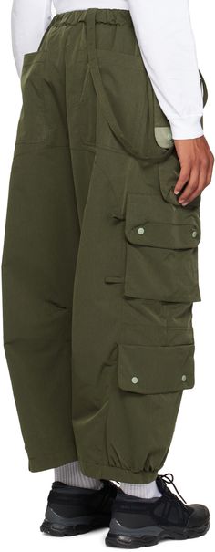 Polyester taffeta cargo pants. Cargo pockets and loops throughout. · Detachable hook-eye strap at partially elasticized waistband · Integrated magnetic belt · Four-pocket styling · Zip-fly · Logo flag at front · Detachable patch pocket at outseams · Pleats at inseams Supplier color: Green Fly Logo, Pants Cargo, Hook Eye, Luxury Streetwear, Cargo Pants, Patch Pocket, Designer Fashion, Women Wear, Perfect Clothing