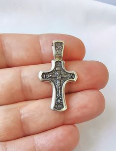 Orthodox silver cross with the crucifixion of Jesus Christ. Available in oxidized silver and 14K gold plated silver. It has a silver mark of quality. material: silver sample 925 plating: 14K gold Pendant Height: 3.7cm / 1.46inch pendant width: 2.1 cm / 0.83 inch Pendant Weight: 4.79 grams of genuine solid silver Due to the hand-crafting of the crosses, there is a slight difference in weight from 0.2 grams to 0.5 grams Sterling Silver Oxidized Crucifix Necklace, Oxidized Cross Pendant Necklace, Orthodox Cross Necklace, Orthodox Cross, Crucifixion Of Jesus, Silver Cross Pendant, Jesus Christus, Christian Cross, Oxidized Silver