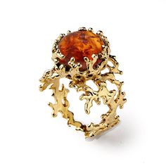 Inspired by the marvelous variety of life forms, colors and shapes of the reef ecosystem, this charming ring depicts the image of a coral guesting in its structure a beautiful Baltic Amber cabochon. The design enhances the light of the gemstone, adding a note of surprise to this ring. This ring is part of our trademark collection inspired by my fascination for the magic of the underwater world.  See the actual ring in 360 degree video on our Youtube channel - https://bit.ly/2QX713N  All our jewe Amber Ring Gold, Amber Engagement Ring, Italian Gold Jewelry, Unique Gold Rings, Beachy Wedding, Orange Gem, Baltic Amber Jewelry, Gold Gemstone Ring, Sea Inspired