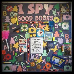 a bulletin board covered in lots of school supplies and magnets with words on it