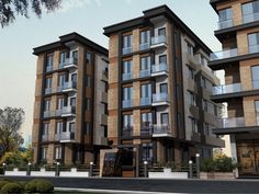 two story apartment building with balconies on the second floor