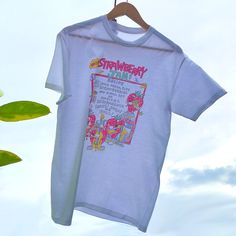 Get yourself in style with this Y2K aesthetic inspired strawberry jam shirt! It's funny, trendy and sure is an ice breaker piece. The cottagecore aesthetic feel of the colors adds up to its charm into becoming your new favorite strawberry jam shirt. Wear it on a farmer's fruit market, in school or anywhere you like. This MilkDesigns original shirt has been very trendy as a spring shirt but we suggest you to wear it on any season! This kawaii shirt will surely be a perfect addition to your kawaii Kidcore Clothing, Aesthetic Strawberry, Kawaii Shirt, Clothes Kawaii, Strawberry Shirt, Fruit Market, Kawaii Clothing, Kawaii Shirts, Ice Breaker