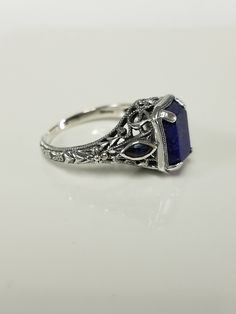 "Thanks for shopping our vintage estate store. We tend to sell well below wholesale and truly hope you enjoy all of our items. Many of the items are one of a kind, so please enjoy scrolling through the pictures and hopefully something will catch your eye. Brown spots are from the camera or reflections Estate sterling silver 925 natural 2ct lapis lazuli sapphire filigree vintage style ring. Last 3 pictures are natural light. Retails $249 on sale $99 Ring size: please select a size Setting: 3/8\" Vintage Sapphire Jewelry For Formal Occasions, Elegant Nickel-free Engraved Ring For Anniversary, Vintage Sterling Silver Filigree Ring, Vintage Sterling Silver Filigree Ring Collectible, Antique Sapphire Jewelry For Anniversary, Vintage Round Sapphire Ring In Sterling Silver, Vintage Sterling Silver Engraved Ring, Vintage Sterling Silver Engraved Ring, Hallmarked, Vintage Formal Ring Stamped 925