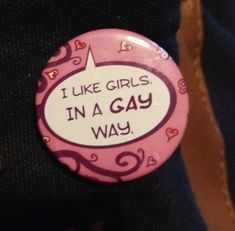 i like girls in a gay way pinback button on someone's back pocket