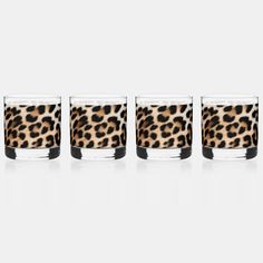 three glasses with leopard print on them