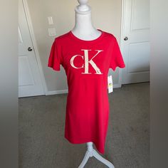 Nwt Calvin Klein Tshirt Logo Dress In Pink Size Medium. The Logo Has A Bit Of Sparkles In It. Cotton Spandex Blend, Loose Fit And Comfortable. Calvin Klein Summer Loungewear Tops, Fitted Short Sleeve Calvin Klein T-shirt, Fitted Calvin Klein Short Sleeve T-shirt, Calvin Klein Fitted Top For Loungewear, Casual Red Calvin Klein Tops, Short Sleeve T-shirt Dress For Loungewear, Fitted Short Sleeve T-shirt Dress For Loungewear, Fitted T-shirt Dress For Loungewear With Short Sleeves, Calvin Klein Tshirt