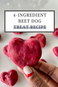 a person holding a heart shaped treat with the words 4 ingredient beet dog treat recipe