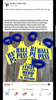 two yellow tags with blue handles are on a wooden table next to each other and the tag says, hey hall pass