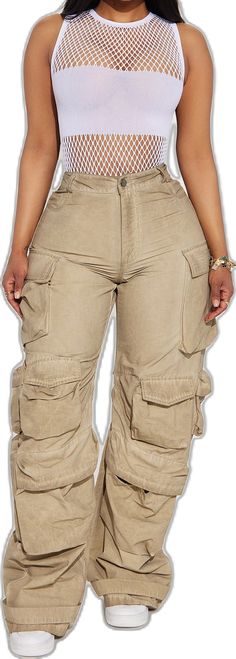 Fall Utility Cargo Pants With Button Closure, Baggy Utility Bottoms For Fall, Beige Cargo Jeans With Side Pockets, Utility Cargo Pants With Button Closure, Fall Utility Baggy Bottoms, Trendy Fall Cargo Pants With Button Closure, Khaki High Waist Utility Parachute Pants, Trendy Baggy Bottoms With Button Closure, Casual Khaki Cargo Pants With Button Closure