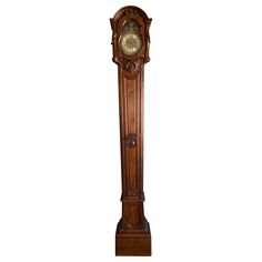 a tall wooden clock with roman numerals on the face and sides, standing in front of a white background