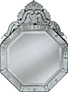 an ornate mirror is shown against a white background