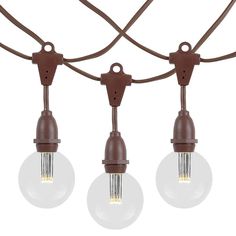 three light bulbs hanging from a wire with brown cords and clear glass globes on them