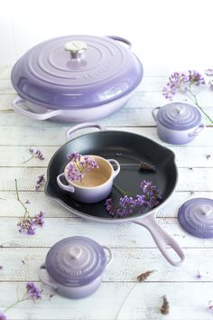 a pan with some lavender flowers in it