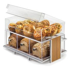 a display case filled with lots of different types of breads and muffins