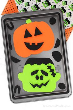 a tray with some halloween decorations on it