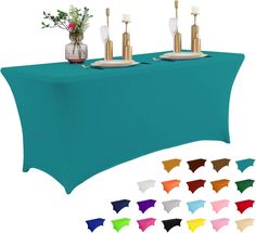 a table covered in a teal colored cloth