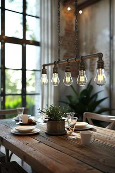 a wooden table with some lights hanging from it