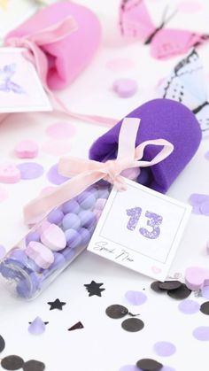 there is a purple bag with candy in it and a tag that says 25 on it