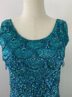 Vintage Sleeveless Sequin Top, Vintage Embellished Sleeveless Top, Vintage Beaded Sleeveless Top, Green Sleeveless Sequin Top, Blue Embellished Sleeveless Top, Vintage Beaded Tops For Summer, Fitted Blue Beaded Tops, Evening Gala, Beaded Blouse