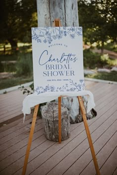 a sign that says charlotte's bridal shower is on an easel outside