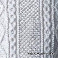 an image of a white knitted sweater with cables on the front and back side