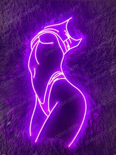 purple neon light up woman's face in the shape of a heart on fur