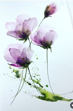 watercolor painting of three pink flowers on white paper with green and purple paint splatters