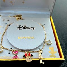 Disney Minnie Mouse Charm Bracelet , Iconic Face, The Word Beautiful, 2 Heart Shaped Crystal And A Pink Bow Makes Up The Dangling Charms. Pull Chains Adjust To A Comfortable Fit. Fine Silver Plated , Gold Tone Color. Disney Gold, Disney Jewelry, Pull Chain, How To Make Bows, Pink Bow, Fine Silver, Womens Jewelry Bracelets, Red Gold, Minnie Mouse