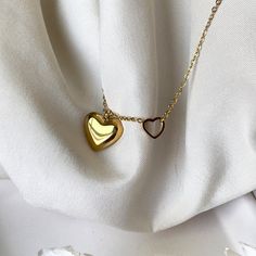 This 2in1 Golden Heart Necklace is perfect for making a statement.  Crafted with 18k gold, it is both dainty and feminine, yet adjustable to enhance your sophisticated style.  Its waterproof, hypoallergenic, and anti-tarnish components guarantee a timeless and classy look that you can enjoy for years to come. ☆Waterproof gold necklace ☆Hypoallergenic necklace ☆Anti tarnish ☆40cm + 5cm extension for extra comfort and styling ✨ABOUT CRESCENT JEWELRY DESIGNS All jewelry is made by Crescent Jewelry Designs in the heart of Nashville Tennessee. Designing unique and beautiful jewelry is our passion, and our goal is to make sure you are 100% satisfied with the products. Each piece is made with hypoallergenic earring posts and free from lead and nickel. If you have any questions or concerns regardi Dainty Gold Locket Necklace As Gift For Her, Hypoallergenic Gold Heart Necklace, Gold Hypoallergenic Heart Necklace As Gift, Gold Hypoallergenic Heart Necklace For Gifts, Minimalist Pendant Chain Necklace For Valentine's Day, Minimalist Clavicle Chain Necklace For Valentine's Day, Minimalist Pendant Necklace For Valentine's Day, Minimalist Chain Necklace For Valentine's Day, Tarnish Resistant Double Heart Necklace For Mother's Day