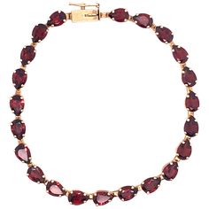 14 Karat Yellow Gold 6 Inch Fancy Link Garnet Bracelet. 22 garnet stones in total. Each measures approx. 6.25mm by 4mm. 5 grams total weight. Victorian Pendant Necklace, Garnet Drop Earrings, Victorian Bracelet, Garnet And Diamond Ring, Retro Bracelet, Victorian Pendants, Garnet And Gold, Garnet Bracelet, Gold Cross Pendant