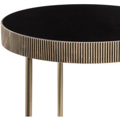 a black and gold table with metal legs