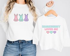 Mama and Mini Easter Matching Sweatshirts, Mommy and Me, Baby and Mom Easter, Momma and me sweatshirts, Mom Daughter Easter BUnny Sweatshirts IMPORTANT PLEASE READ FOR MAMA & MINI SWEATSHIRTS:  Items in photo shown need to be ordered as two separate items - 1. Mama Sweatshirt 2. Mini Shirt These items MAY ship separately.  Our designs are made with quality commercial grade materials and pressed with a professional commercial heat press for long lasting wear. Ordering made easy. Each item sold separately, add each to cart individually. ➜1. 'Mama' Sweater - Chose your your desired size and quantity from the drop down checkout menus ➜2. Add to cart ➜3. 'Mini' Sweater - Available in Youth, Toddler and Infant IMPORTANT PLEASE READ Youth - This is a crewneck sweater - sizes XS - L Toddler - This Cute Long Sleeve Tops For Mother's Day, Playful White Tops With Bunny Print, Playful White Top With Bunny Print, Playful White Bunny Print Top, Cute White Sweatshirt For Mother's Day, Cute Long Sleeve Tops, Easter Sweatshirt, Mama Sweater, Baby Mom