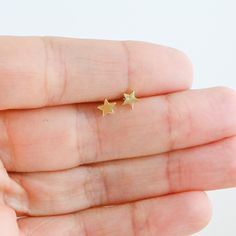 Tiny, plain minimalist star earrings! Perfect for a dainty look or on multiple piercings! ►► Details ▸ Measures 5mm x 5mm ▸ Made of 925 Sterling Silver plated in 14k Gold, 14k Rose Gold, or Rhodium ▸ We use a THICK plating for piece that will last you years to come ▸ Sold as a PAIR ▸ Push back closure ▸ Nickel-free ▸ Hypo-allergenic ✈️Ships outs SAME DAY for fast delivery. Domestic Orders are delivered at your doorstep in 2-3 days! 🎁Packaged in a white gift box, ready for gift-giving! If you ha Gold Star Cartilage Earrings In Minimalist Style, Gold Star Cartilage Earrings Minimalist Style, Minimalist Star Earrings For Everyday, Minimalist Star Charm Earrings As Gift, Minimalist Star-shaped Hypoallergenic Cartilage Earrings, Minimalist Star-shaped Single Cartilage Earring, Minimalist Hypoallergenic Star Cartilage Earrings, Hypoallergenic Star-shaped Everyday Earrings, Hypoallergenic Star Earrings For Everyday