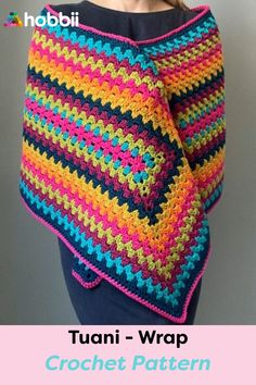 a woman wearing a colorful crochet shawl with text that reads, tuani -