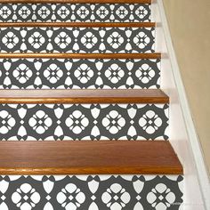 the stairs are decorated with black and white designs