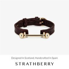 Handcrafted from our signature highest quality leather with an embossed leather finish, this bracelet will add a stylish touch to any look. Featuring our signature music bar made from gold-plated brass, this bracelet features an adjustable buckle closure for a variety of sizing options. This strathberry bracelet features leather handcrafted in spain, and our hardware detailing finely crafted in italy. All pieces are presented in a velvet-lined luxury gift box, the perfect finishing touch for that special someone or as a treat for yourself. Music Bar, Bar Bracelet, Leather Finish, Bar Bracelets, Luxury Gift Box, High Quality Leather, Embossed Leather, Leather Bracelet, Gift Box