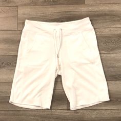 Size Small. Basic White Bottoms With Built-in Shorts, White Basic Bottoms With Built-in Shorts, Casual White Athletic Shorts With Short Inseam, White Basic Shorts For Spring, Basic White Shorts For Spring, Spring Athleisure Bermuda Bottoms, White Stretch Bermuda Shorts, Stretch Cotton Calvin Klein Bottoms, Calvin Klein Stretch Cotton Bottoms