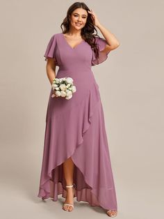 Make a statement at your next wedding event with this stunning chiffon bridesmaid dress featuring a delicate lotus leaf hemline.The flowing and lightweight material will have you feeling comfortable and elegant all day and night.The v neck and ruffles sleeve add a touch of femininity, while the fitted waistline accentuates your curves in all the right places.This dress is perfect for any season and can be dressed up or down with the right accessories.Don't miss out on this must-have piece for yo Ruffles Bridesmaid Dresses, High Low Bridesmaid Dresses, Formal Maternity Dress, Ethereal Dress, Plus Size Elegant, Plus Size Bridesmaid, Ever Pretty, Bridesmaid Dresses Plus Size, Custom Size Dresses