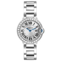 Cartier Ballon Bleu White Gold Diamond Bezel Ladies Watch WE9003Z3. Quartz movement. Caliber 057. Round 18K white gold case 28.0 mm in diameter. Case thickness: 9.35 mm. Fluted crown set with a blue sapphire cabochon. 18K white gold bezel set with original Cartier factory diamonds. Scratch resistant sapphire crystal. Silver sunburst dial with Roman numerals. Blued steel sword shape hands. 18k white gold bracelet with hidden butterfly clasp. Fits 6.5" wrist. Cartier Diamond Watch With Round Dial, Cartier Diamond Watch With Diamond Accents, Diamond Watch Accessories With Subdials, Cartier Diamond Watch With Polished Finish, Round Cartier Diamond Watch With Polished Finish, Classic Diamond White Round Diamond Watch, Cartier Jewelry With Diamond Hour Markers, Formal Diamond White Watch With Metal Dial, White Diamond Round Watches