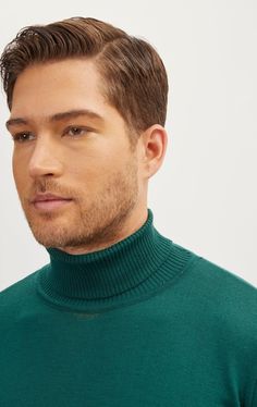 DETAILS Elevate your style with our clean roll neck knit sweater, crafted from a finely textured cotton acrylic blend. Featuring a roll neck and an elegant smooth finish, this sweater is a must-have for the modern man's wardrobe. It's both cozy and versatile, perfect for layering with any of our wool suits to achieve a modern and polished look. Stay sharp and sophisticated effortlessly.SIZE + FITMuscle fit, to find your correct size use the "What's my size" button. COMPOSITION50% Cotton 50% Acry Green Turtleneck Sweater With Ribbed Cuffs, Classic Knit Turtleneck, Classic Fitted Green Polo Sweater, Fitted Classic Green Polo Sweater, Green Fitted Classic Polo Sweater, Classic Green Sweater With Ribbed Collar, Classic Solid Knit Turtleneck, Knit Turtleneck Polo Sweater, Green Turtleneck Top With Ribbed Cuffs