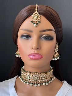 Green Fine Kundan Indian Bridal Choker, Wedding necklace, Fine kundan jewelry, Pakistani Jewelry, Indian Jewelry, Bridal Jewelry Gold-plated foiled Kundan necklace set.  Regular Size And Adjustable Ships from California, USA Delivery in 2-5 business days in the USA. Other designs can be found here https://www.etsy.com/listing/1381240765/premium-quality-gold-plated-silver?click_key=e1a9e46c1ba3dcb2d7ddeb00610b709b7497bd62%3A1381240765&click_sum=5b5797e9&ref=shop_home_active_511&pro=1&frs=1&sts=1 Kundan Choker For Wedding And Festivals, Kundan Choker With Pallu For Wedding, Kundan Choker With Cutdana For Wedding, Green Kundan Choker For Wedding, Kundan Necklace With Pallu For Weddings, Kundan Meenakari Choker For Wedding, Indian Bridal Choker, Jewelry Pakistani, Kundan Necklace Set