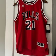 Youth Large Adidas New With Tags Chicago Bulls Jersey #21 Butler Adidas Red Sporty Top, Red Adidas Sporty Top, Sporty Red Adidas Top, Adidas Red Sports Top, Chicago Bulls Jersey, Bulls Jersey, Adidas New, Adidas Shirt, Red Adidas