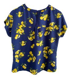 This lemon-print blouse from Banana Republic is a stylish and versatile option for any occasion. The lemon motif is bright and cheerful, adding a pop of color to any outfit.

It features a relaxed fit, rounded neckline and short sleeves, making it perfect for layering or wearing on its own. The drapey fabric will keep you cool and comfortable all day long. Lemon Print, Rounded Neckline, Sustainable Fabrics, Print Blouse, Keep Your Cool, Printed Blouse, Workout Shorts, Round Neckline, Everyday Essentials Products