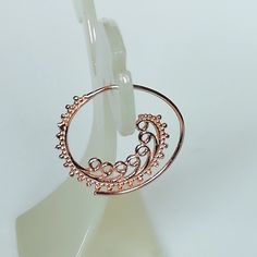 Indian style sterling silver spiral ear hoops. These are dipped in rose gold. Dimensions: 25 mm x 26 mm Price listed is for a pair. These earrings are made of 925 hypoallergenic sterling silver and rose gold All my pieces are sent in a gift box. I can include a personal message from you if needed. You are welcome to contact me at... bhavnakwintra1956@gmail.com More hoops: https://www.etsy.com/your/shops/TheSilverGame/tools/listings/section:26305414 More earrings: https://www.etsy.com/your/shops/ Adjustable Nickel Free Rose Gold Hoop Earrings, Bohemian Rose Gold Jewelry With Ear Wire, Elegant Small Hoop Nickel-free Nose Rings, Elegant Nickel-free Small Hoop Nose Rings, Elegant Silver Hoop Earrings In Copper, Elegant Nickel-free Hoop Nose Ring, Elegant Silver Hoop Earrings With Copper, Small Hoop Sterling Silver Rose Gold Earrings, Elegant Small Hoop Nose Rings Nickel Free