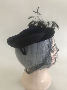 "Vintage 1940s 1950s blue velvet and satin hat with feathers, rhinestones and netting / veil. Sits on top of head. Velvet covered metal pieces at side back to secure to head. Circumfrence: 20\" Depth: 1.5\"" Daphne Scooby Doo Costume, Daphne Costume, Blue Velvet, Veil, Feathers, Blue And White, Velvet, Satin, Hats