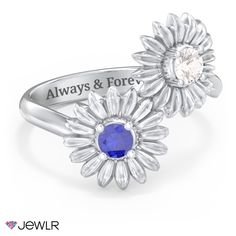 Modern and fresh, this beautiful bypass ring features two blooming sunflowers that sparkle with gemstone centers. Personalize with your choice of genuine birthstones or Brilliance cubic zirconia and create the perfect gift for someone special. Design this ring in sterling silver, yellow, white, or rose gold, and add an engraving along the inside of the band for a personal touch. Diamond Flower Ring With Birthstone For Anniversary, Flower-shaped Anniversary Rings With Accent Stones, Flower-shaped Rings With Accent Stones For Anniversary, Flower Shaped Rings With Accent Stones For Anniversary, Flower Shaped Birthstone Ring For Anniversary, Adjustable Flower Ring With Birthstone For Anniversary, Adjustable Birthstone Flower Ring For Anniversary, Sunflower Design Jewelry For Mother's Day Anniversary, Flower Shaped Ring With Accent Stones For Anniversary