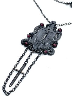 This Shrine necklace is cast in bronze, hand textured, oxidized and set with garnets. This piece is made to order and can take from 2-3 weeks to complete. Feminine Power, 3 Weeks, Dog Tag Necklace, Muse, Garnet, Unique Pieces, Witch, Necklaces, Pendant Necklace